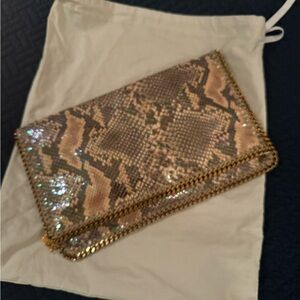 Stella McCartney snake print clutch cream black purple